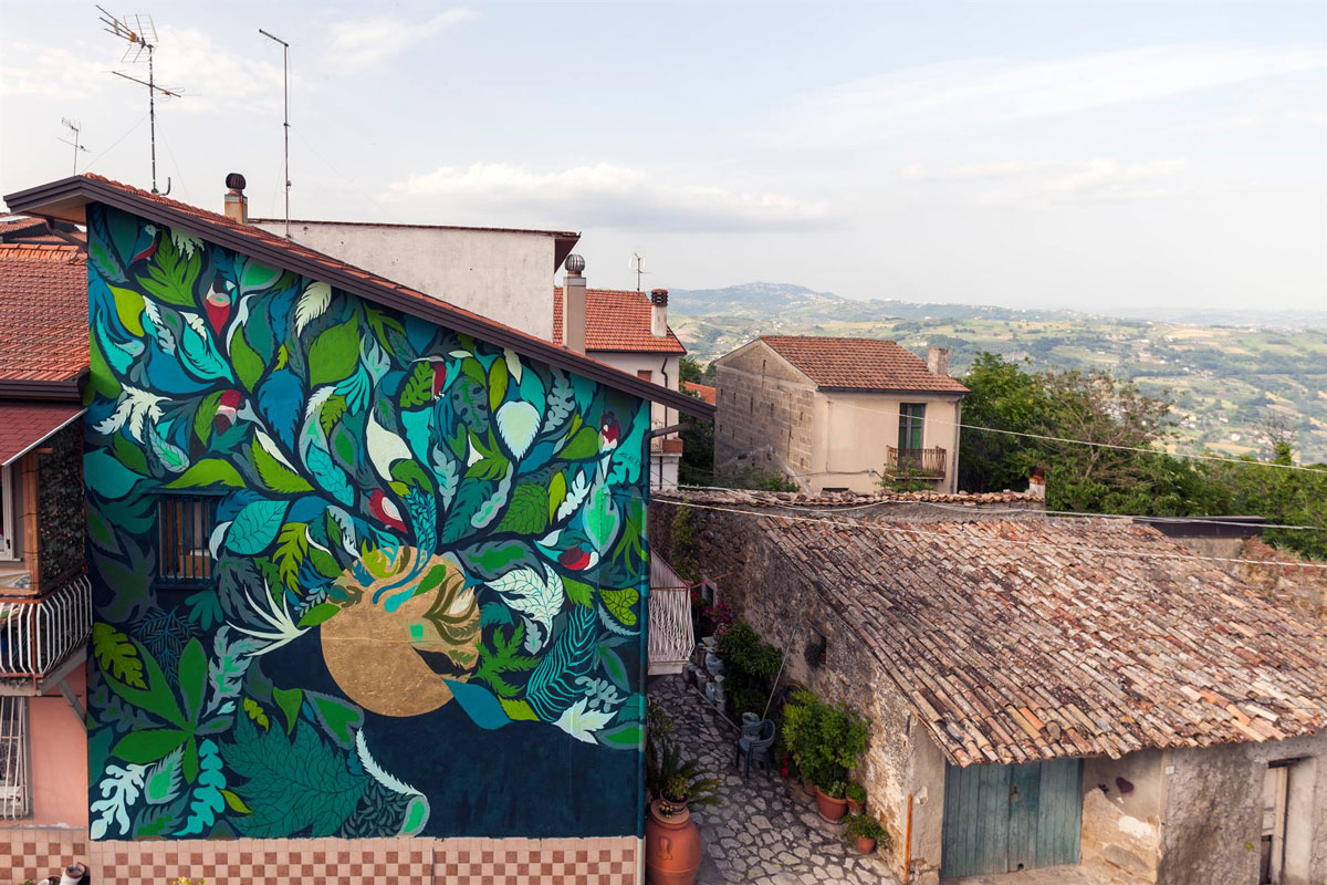 gola hundun artist street art nature vegetation flowes
			plants public art6